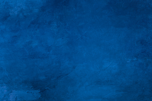 Dark blue backdrop grunge background or texture