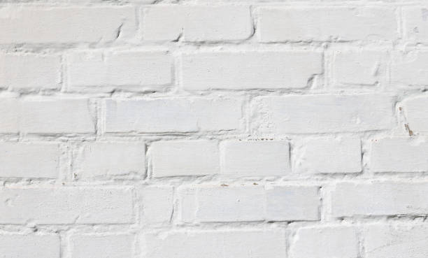 istock brick background with old bricks in white paint, whole bricks and cracked bricks 1301969306