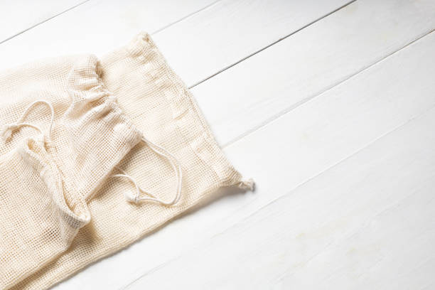 istock Eco-friendly cotton bags on white background 1301976511