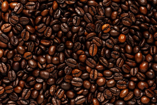 istock Creative backdrop made of coffee beans. Love coffee concept. 1301977583