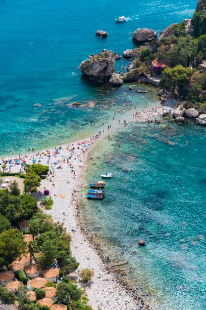 Isola Bella, Taormina Summer vibes on the paradise isle - Isola Bella in Taormina, Sicily isola bella taormina stock pictures, royalty-free photos & images
