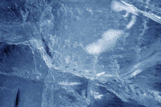 istock beautiful blue ice with cracks. frosty background 1301977837