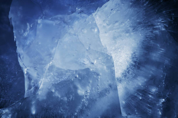 istock beautiful blue ice with cracks. frosty background 1301977839