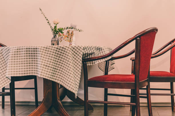 istock Empty Restaurant Table with Flower Decorations - Vintage Look 1301980713