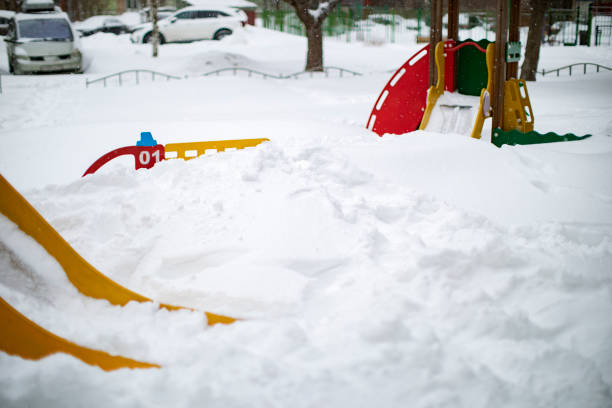 istock Children Playground under the snow 1301980878