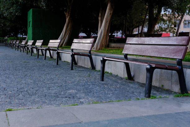 istock Benches in City Parks are Empty 1301981760