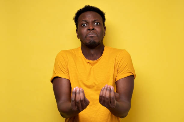 istock African american man doing a typical italian gesture, s arguing with his friend 1301990631