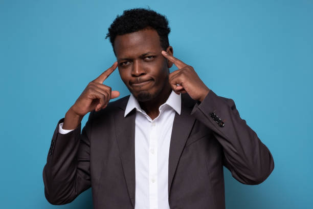 istock african guy tries to recollect information in mind 1301991633