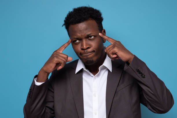 istock african guy tries to recollect information in mind 1301991651