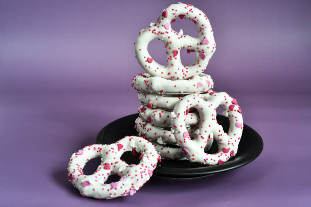 istock White Choclate / Yogurt Covered Pretzels with Sprinkles 1301991797