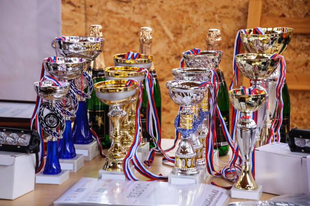 istock Winners cups, medals and champagne 1301992739