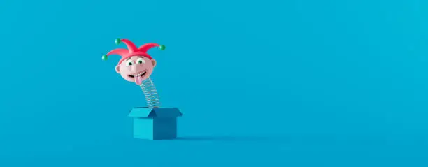 Funny Jack in the box on the blue background. April fools day concept 3d render 3d illustration