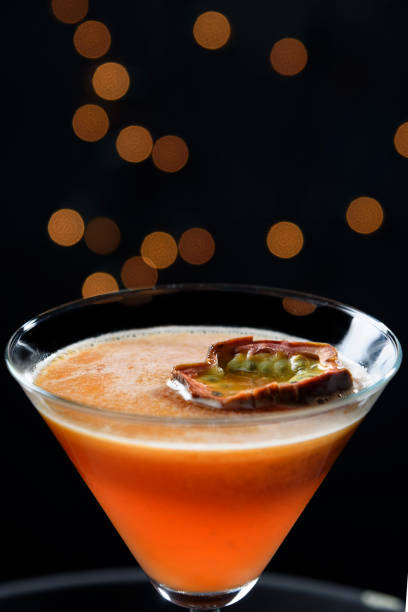 istock Passionfruit martini cocktail with passionfruit garnish 1301999649