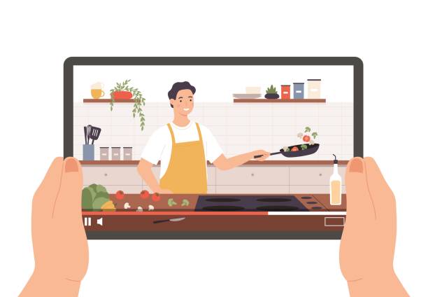 illustrazioni stock, clip art, cartoni animati e icone di tendenza di video di cucina. mani che tengono il tablet con trasmissione culinaria, spettacolo o lezione online. chef che prepara il cibo nel concetto di vettore interno della cucina - youtube ipad video internet