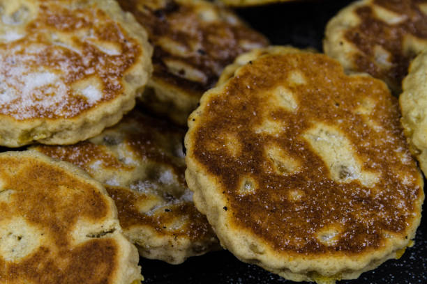 istock Close up of Freshly cooked sugared welshcakes. 1302001701
