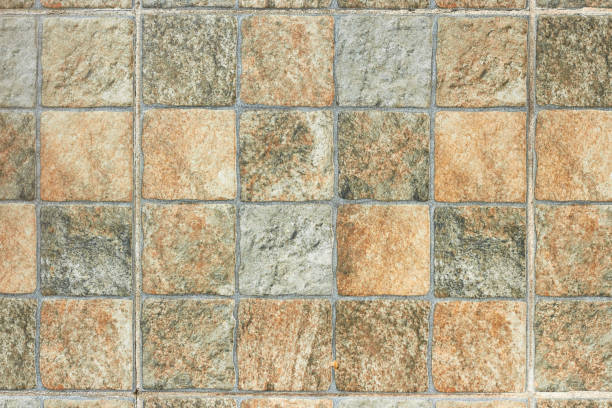 istock Terracotta tiles. Terracotta square tiles pattern texture background 1302004072