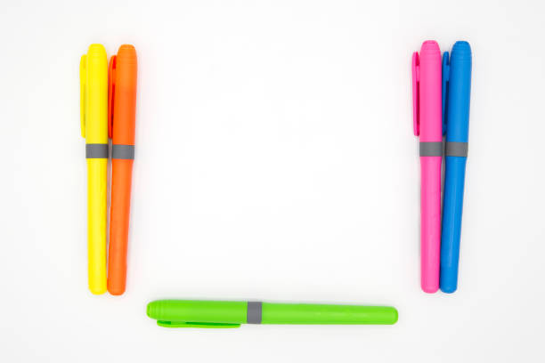 Colored pens on bright blue background