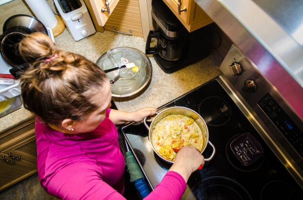 istock Woman mixing vegan soup in pan 1302004806