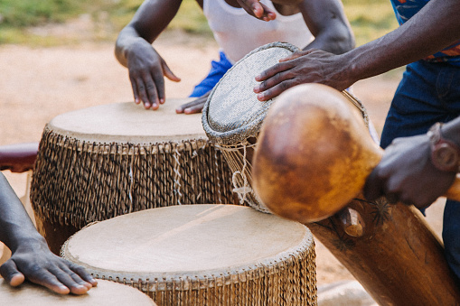Close-up of a man playing the drums in Entebbe, Uganda