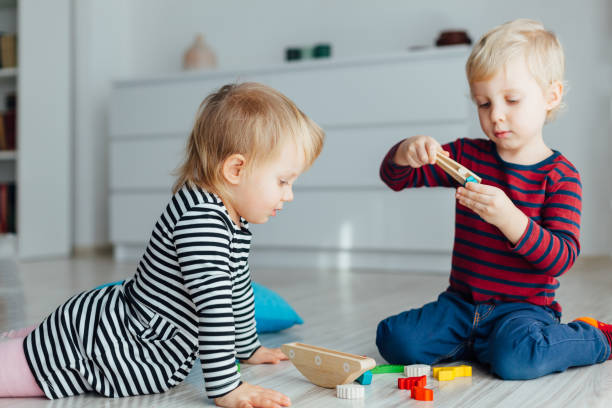 istock Child Playing With Toys 1302012698