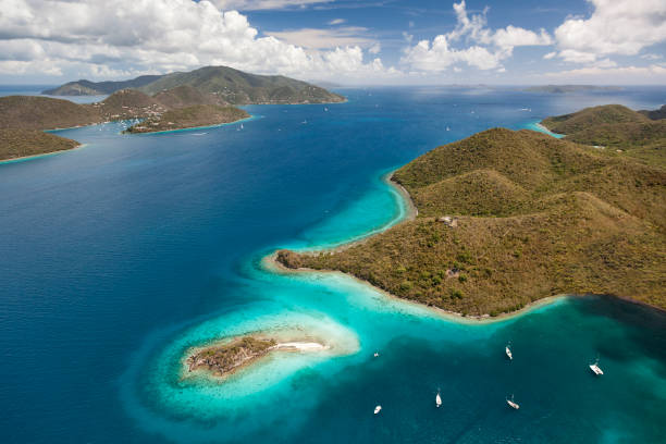 Aerial view of Waterlemon Cay on St. John, Virgin Island with the island of Tortola in the Britsh Virgin Islands in the distance.