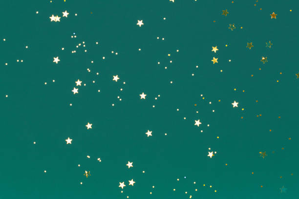 istock Trendy green background with golden stars 1302017835