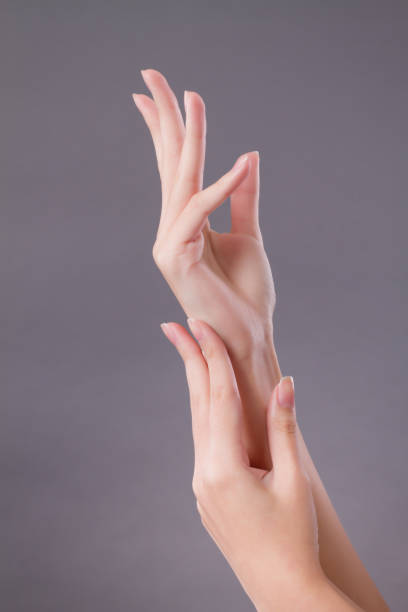 istock beautiful woman hand studio shot 1302017939