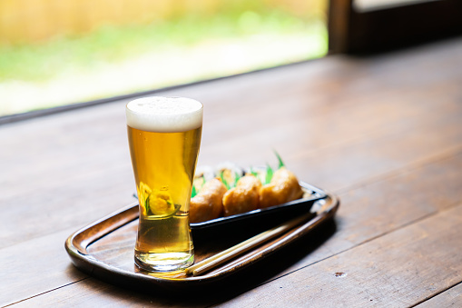 Japanese style house, veranda , beer and sushi