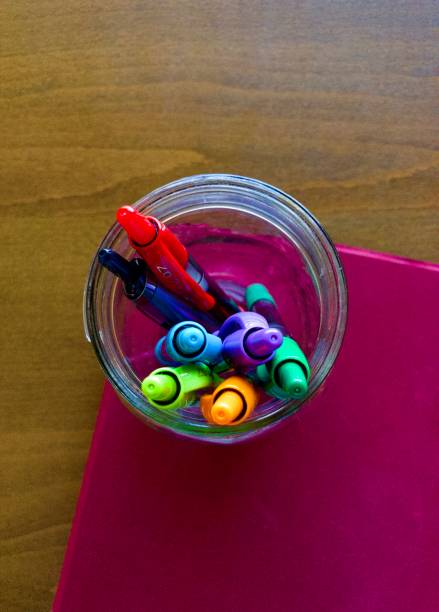 istock Colorful pens in glass mason jar 1302022095