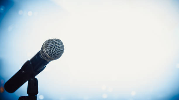 istock Close-up of classic microphone at concert. 1302028595