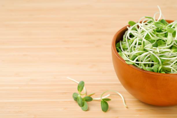 istock Healthy vegetable salad on wooden floor, top view 1302032034