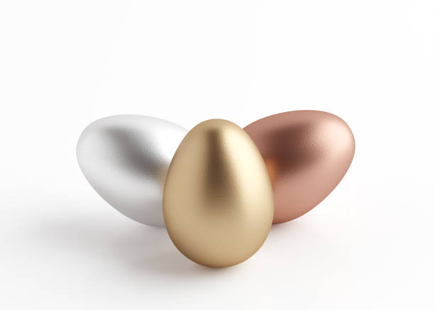 istock Three precious metal eggs. White background. 3D rendering and 3D illustration. 1302041313