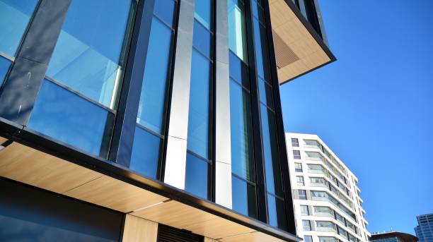 istock A residential building and an adjacent office building. 1302047578