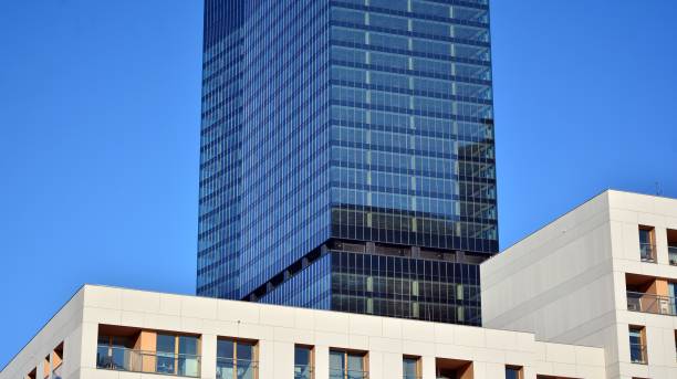 istock A residential building and an adjacent office building. 1302047588
