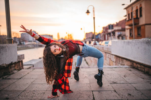 istock A young woman playing in the streets 1302049552