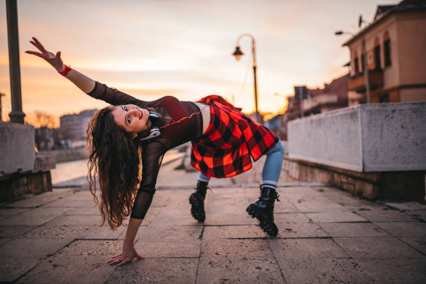 istock A young woman playing in the streets 1302050094