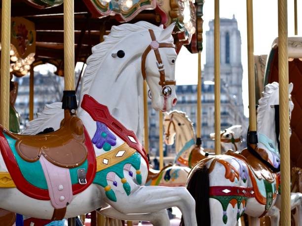 istock Horse carousel in a Paris city 1302062488