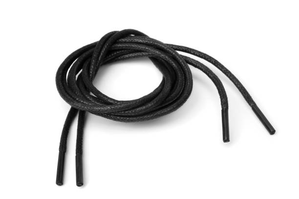 Black shoelaces Black shoelaces on white background lace fastener photos stock pictures, royalty-free photos & images