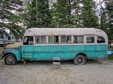 Abandoned green white bus, near Fairbanks Healy, Alaska, USA