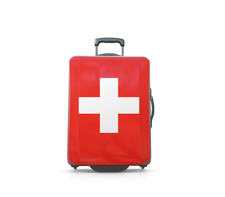 Switzerland vacations and travel destinations flag painted suitcase concept