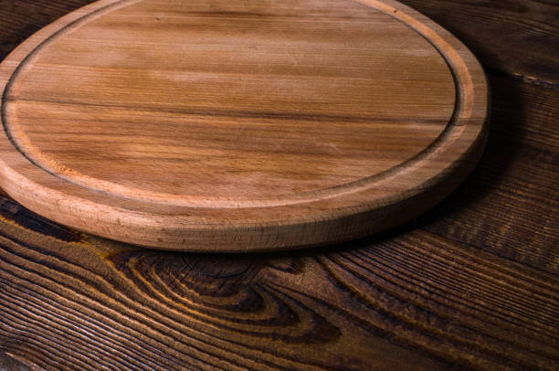 istock cutting board made of wood 1302072103