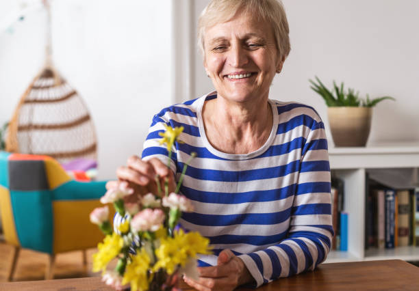istock Senior woman at home 1302076181