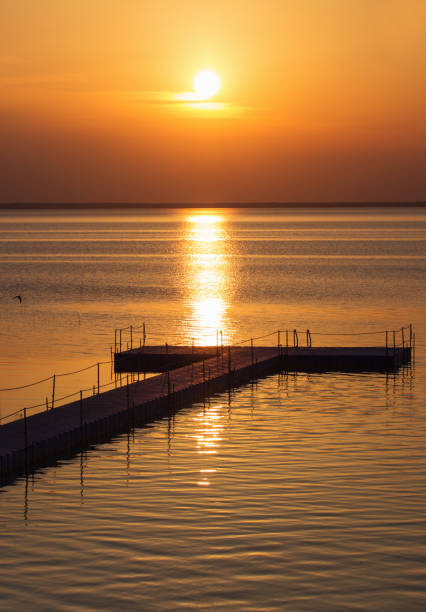 istock pontoon pier at beautiful summer sunset 1302076252