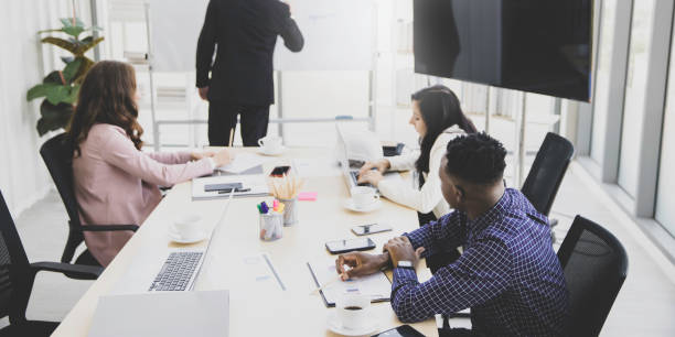 istock Group diversity etchnicity working team brainstorming together in meeting board room at modern office 1302076377