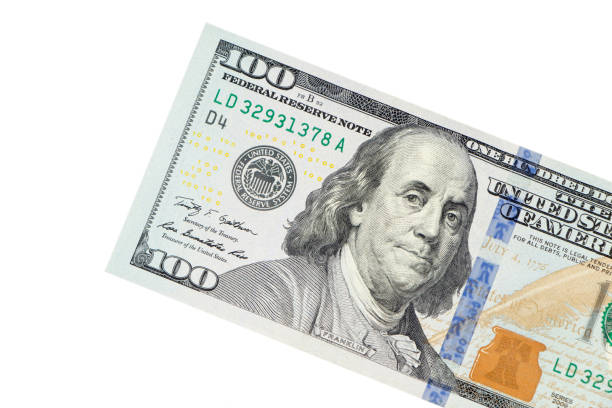 istock Portrait of Benjamin Franklin from one hundred dollars bill new edition macro 1302077080