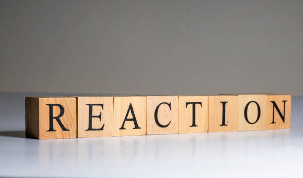 istock Reaction Word In Wooden Cube. Close up. 1302078335