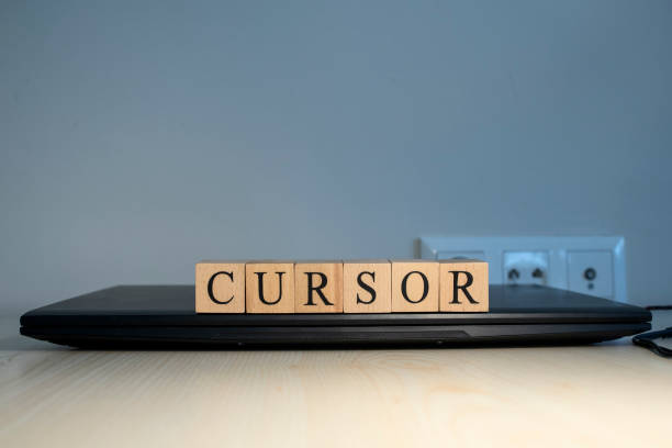 istock The word cursor is written. Computer and headset in the background. 1302080370