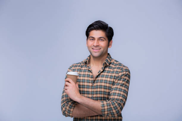 istock portrait of young men drinking coffee 1302081248