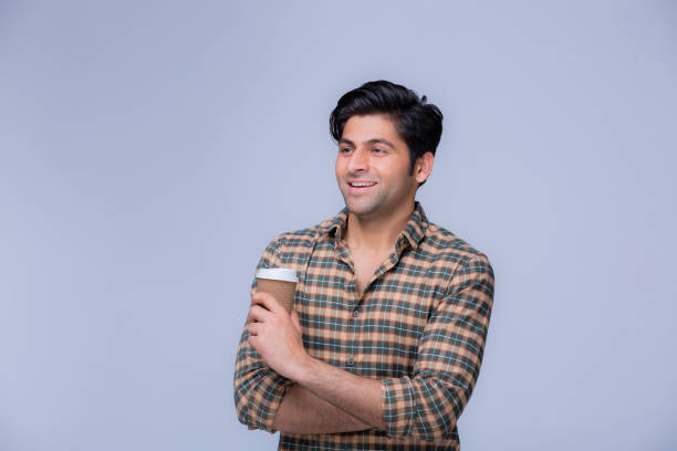 istock portrait of young men drinking coffee 1302081300