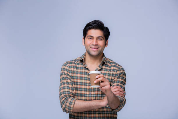 istock portrait of young men drinking coffee 1302081343